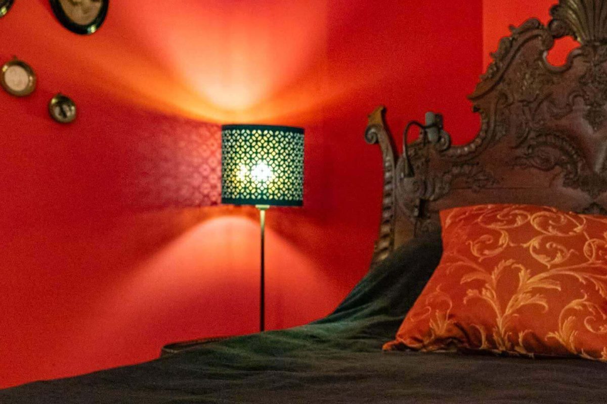 Red Lounge has an old Portuguese Mahogany bed in Dom Joao V-style.