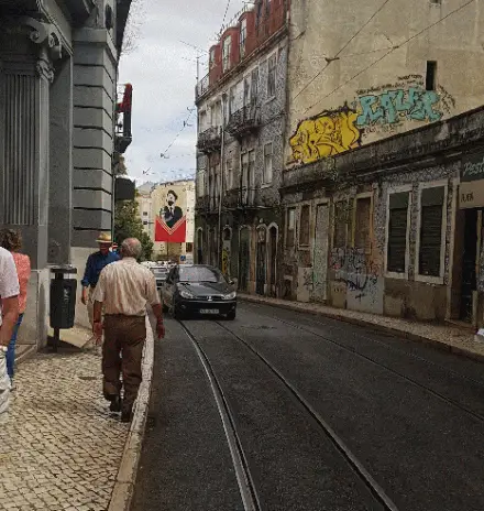Street art by Vhils & Shepard Fairey in Graça, Lisbon