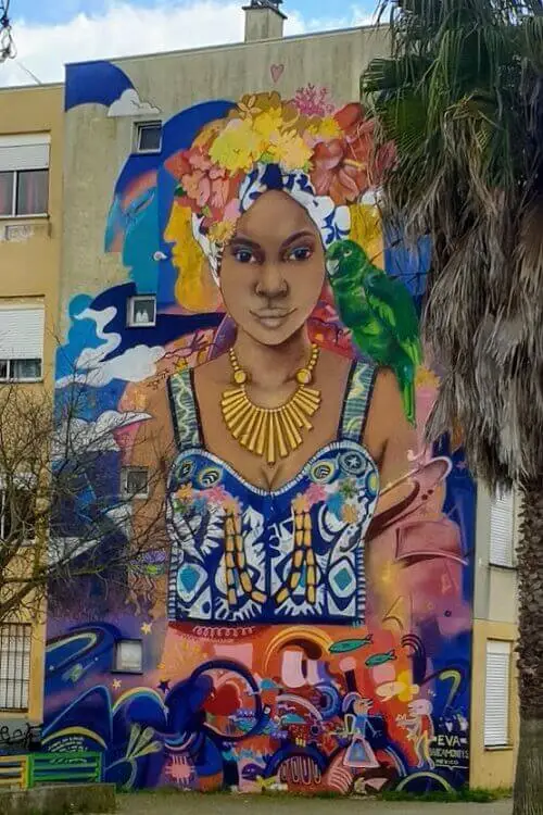 Street art by Eva Bracamontes in Quinta do Mocho, Lisbon