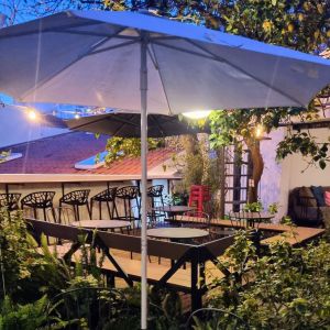 Lush green garden at Tings Lisbon, 30 meters from the best view point in happening Graça