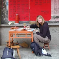 Annette eats lunch at the local restaurant in Lijang, China